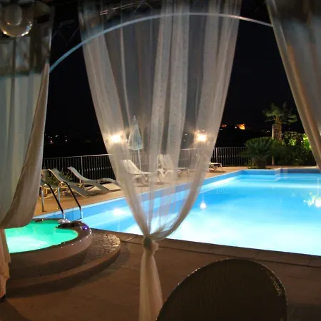 With Salt Water And Heated Pool And Jacuzzi Near The Sea